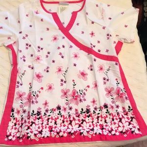 1 scrub top- brand is UA Scrubs